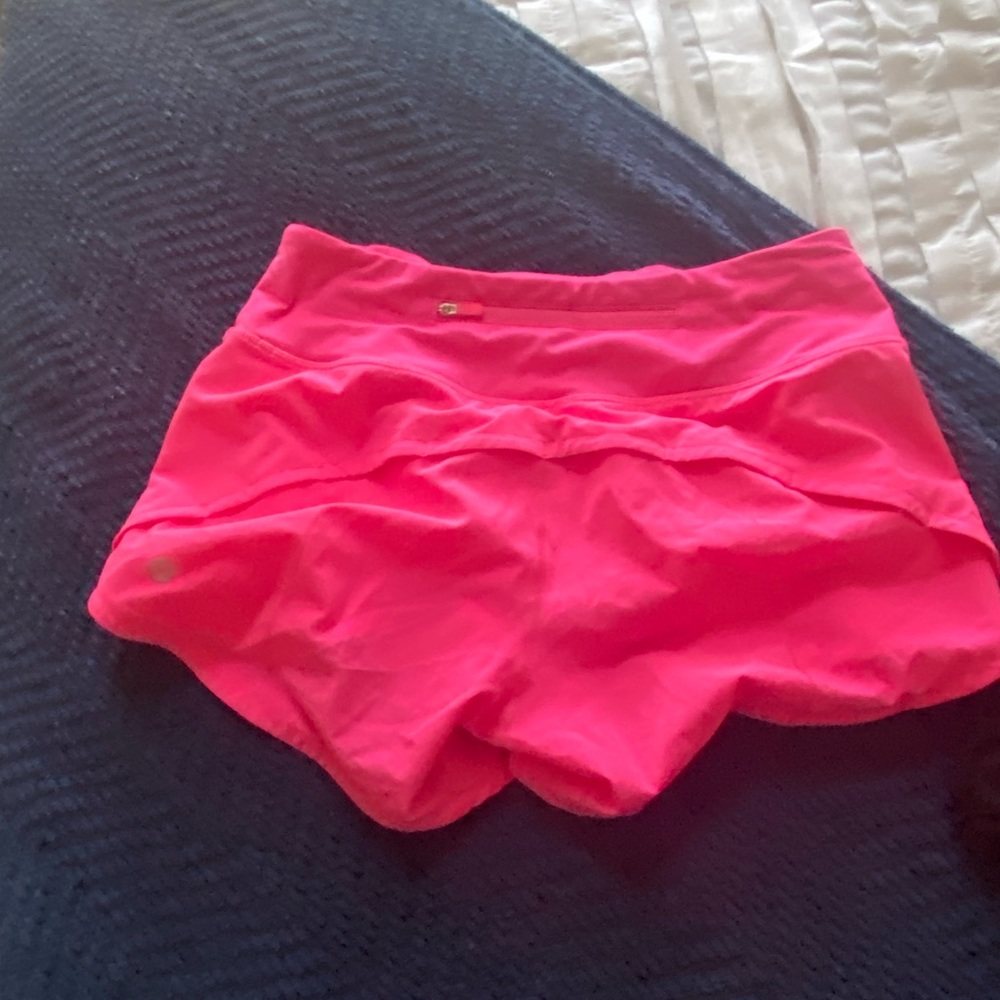 Neon pink speed up four inch shorts